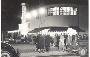 A vintage photograph of patrons outside the Old Greenbelt Theatre