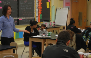 Teacher Teaching Classroom with Kids and Parents