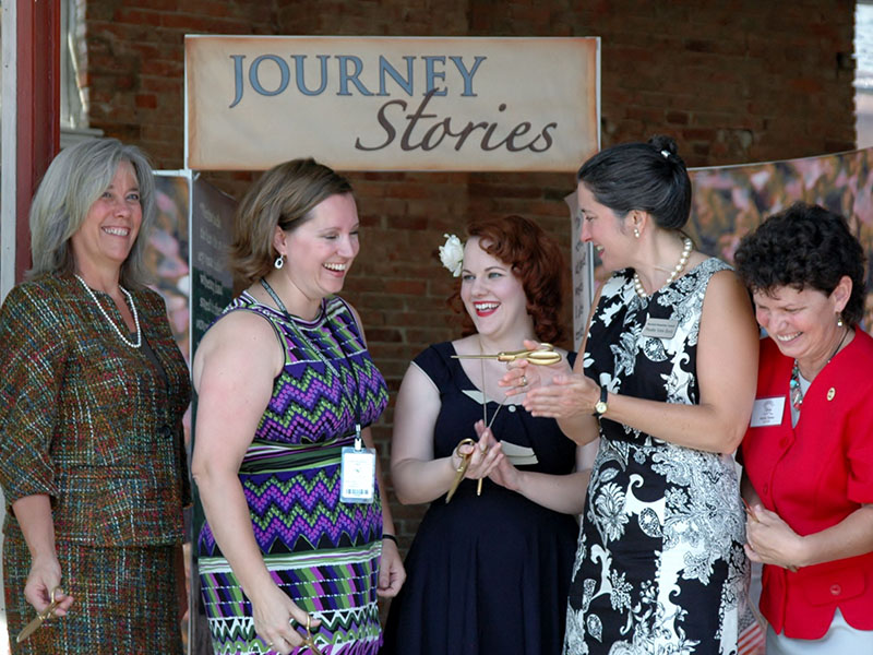 Journey Stories Ribbon Cutting